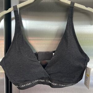 NWT $32 Calvin Klein lightly lined triangle bra. Dark gray.  Size M